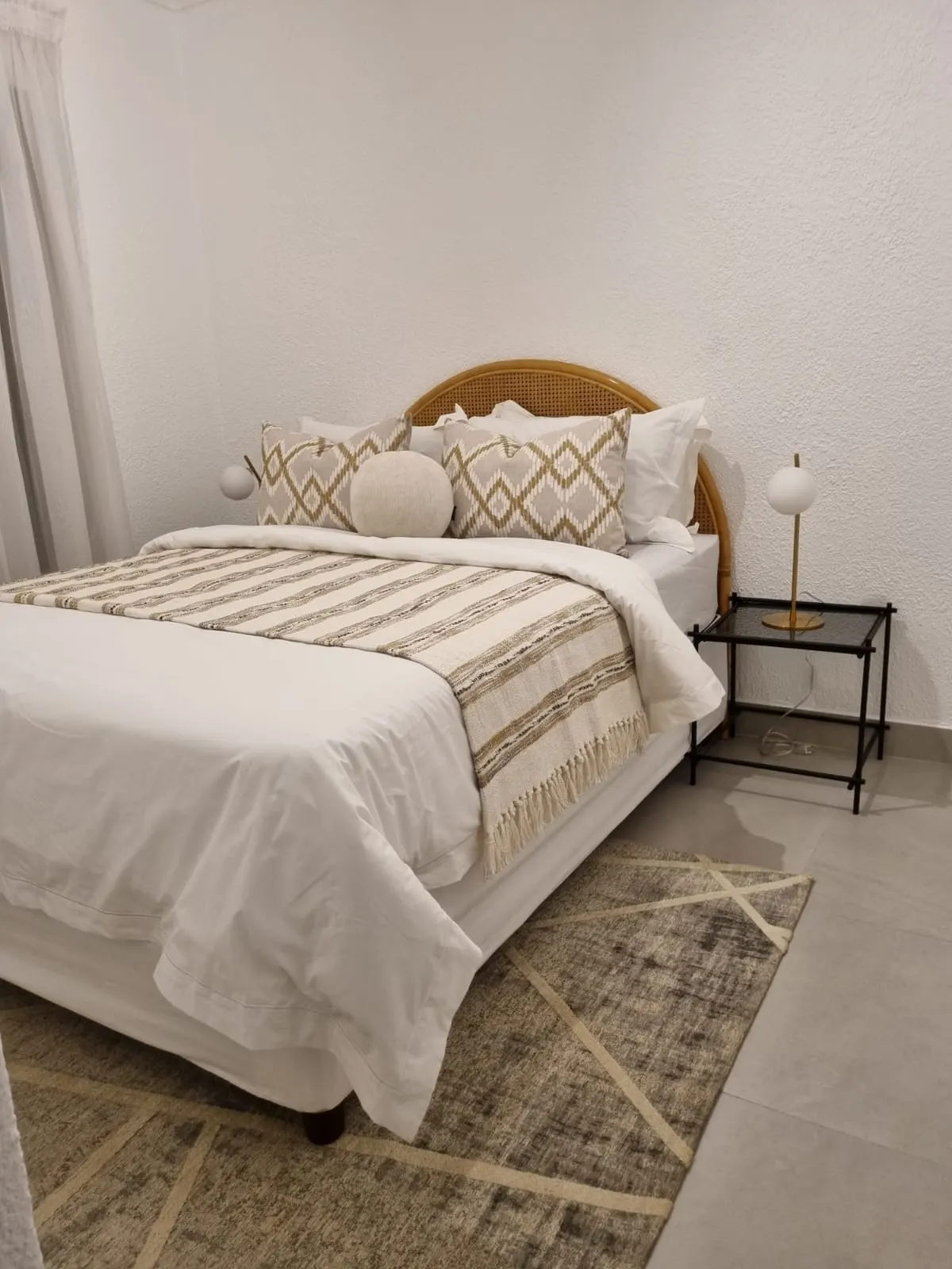 Finished bedroom styled after renovation