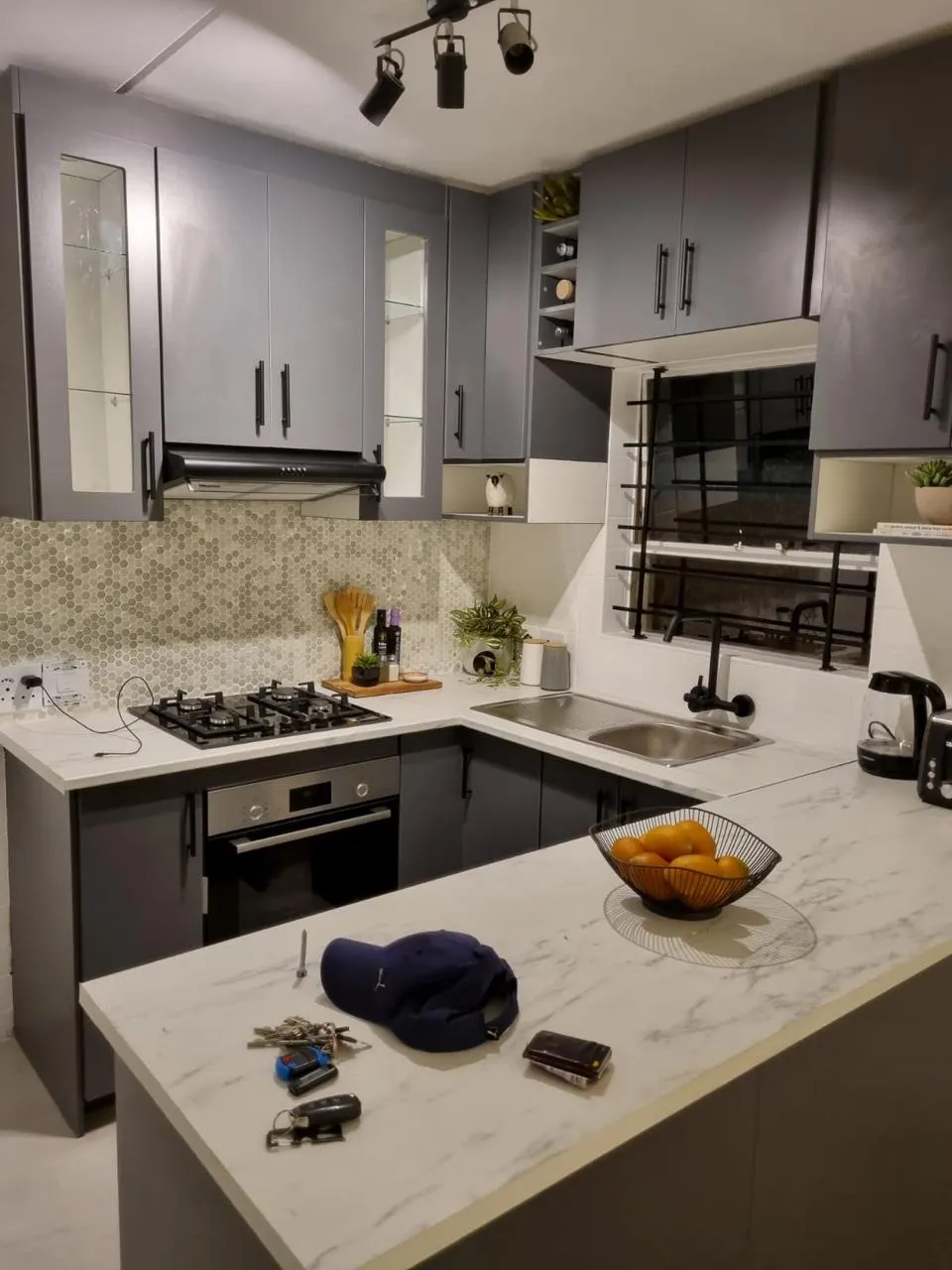 Custom grey kitchen installation