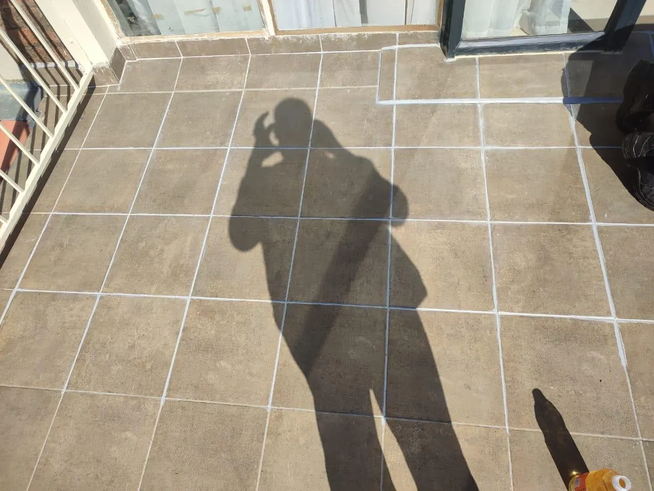 Balcony tile regrouting