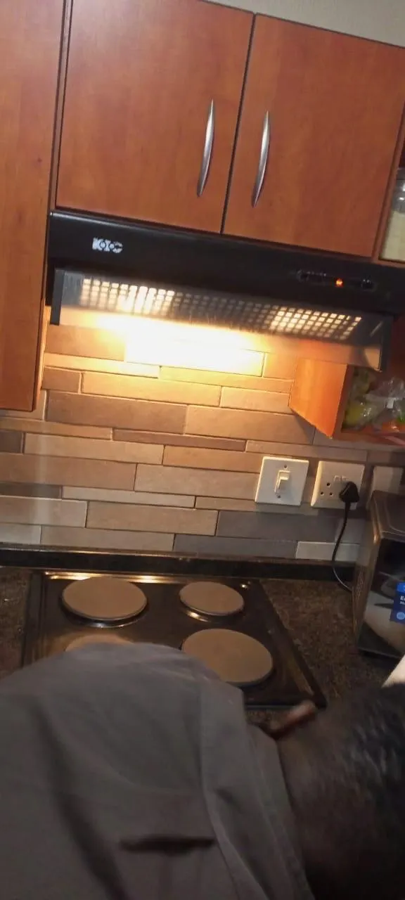 Kitchen extractor and stove fitting